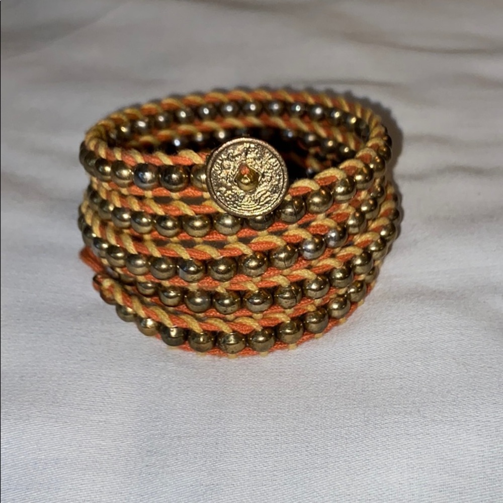 Yellow and orange coil-like bracelet